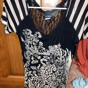 Super cute top size XL with animal print on the front in perfect condition